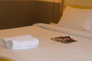 Letto o letti in una camera di Julley Commune Rishikesh