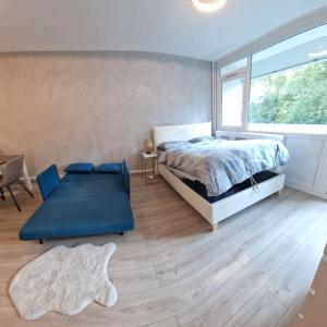 Ένα ή περισσότερα κρεβάτια σε δωμάτιο στο Charming new appartment near Geneva