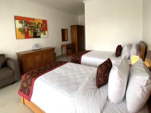Letto o letti in una camera di Nivaluma