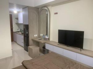 Et tv og/eller underholdning på COMFORTSTAY-Pollux Mall Batam Center TOWER B #3902