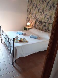 A bed or beds in a room at casa Dany