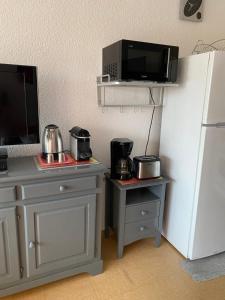 Kuchyňa alebo kuchynka v ubytovaní Location Vacances entre mer et montagnes
