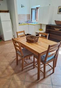 Kuchyň nebo kuchyňský kout v ubytování Appartamenti Il Capomandro