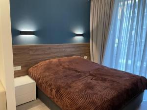 Ένα ή περισσότερα κρεβάτια σε δωμάτιο στο Crystal Resort