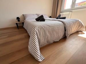 Posteľ alebo postele v izbe v ubytovaní Apartmán Šumava