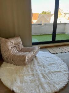 Posezení v ubytování Cosy house in Vilvoorde with jacuzzi and spa