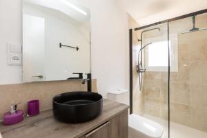 Koupelna v ubytování Apartamentos Entrepuentes