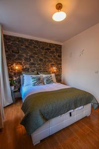 En eller flere senge i et værelse på Casa Laurinda Funchal