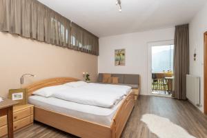 Postel nebo postele na pokoji v ubytování Sonnenhof- Urlaub auf den Bauernhof
