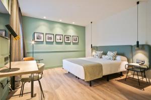 Postel nebo postele na pokoji v ubytování Hotel Via Augusta