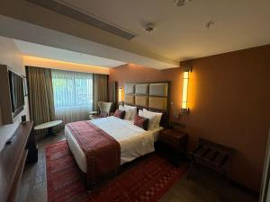 Cama ou camas em um quarto em Sile Gonen Hotel