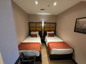 Cama ou camas em um quarto em Sile Gonen Hotel