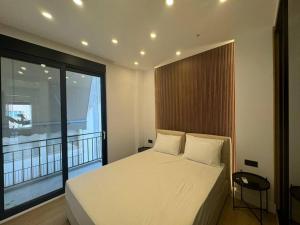 Postel nebo postele na pokoji v ubytování BlueMotion - PortSuite 4A