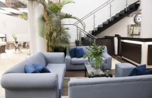 Χώρος καθιστικού στο Hotel Acqua Medellín