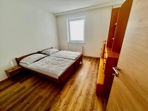 Posteľ alebo postele v izbe v ubytovaní Ferienhaus Rabl