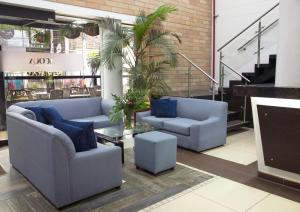 Χώρος καθιστικού στο Hotel Acqua Medellín