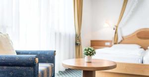 Ένα ή περισσότερα κρεβάτια σε δωμάτιο στο Saldur Small Active Hotel
