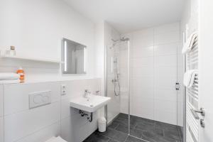 Phòng tắm tại VR-Serviced Apartments Würzburg +17 ảnh