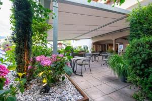 Κήπος έξω από το Saldur Small Active Hotel