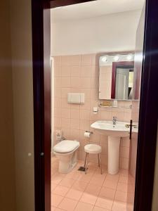 Koupelna v ubytování Hotel Due Torri Tempesta