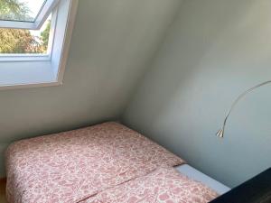 Postel nebo postele na pokoji v ubytování Blätterwald