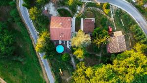 an overhead view of a house with a road at Saecula Natural Village Experience in Force