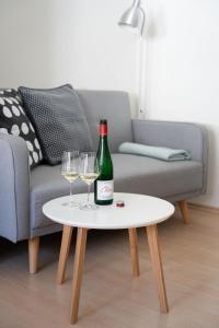 Posezení v ubytování Claes Weinquartier - Appartements & Wein by Niko Schmitt