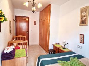 Postel nebo postele na pokoji v ubytování Apartamento Berry Playa Naufragos