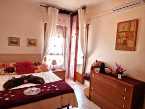 Postel nebo postele na pokoji v ubytování Apartamento Berry Playa Naufragos
