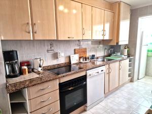 Kuchyň nebo kuchyňský kout v ubytování Apartamento Berry Playa Naufragos