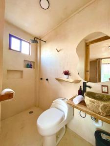Koupelna v ubytování Hotel Casa Maakjä