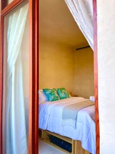 Postel nebo postele na pokoji v ubytování Hotel Casa Maakjä