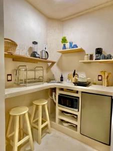 Kuchyň nebo kuchyňský kout v ubytování Hotel Casa Maakjä