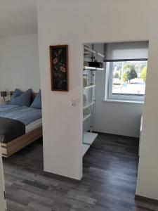 Postel nebo postele na pokoji v ubytování Apartment Fasching