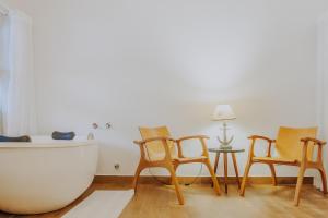 Uma área de estar em Chez Louise et Louis Pé na Areia