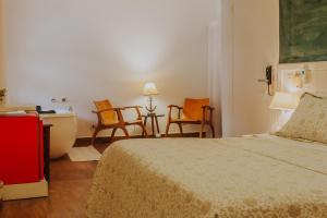 Cama ou camas em um quarto em Chez Louise et Louis Pé na Areia