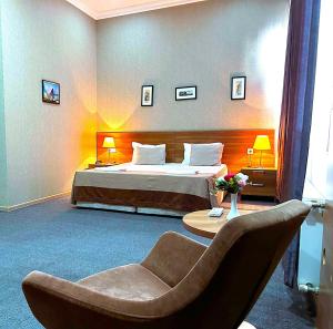 Postel nebo postele na pokoji v ubytování Family Hotel - Free Massage