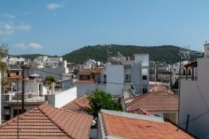 a view of roofs of buildings in a city at Volos Comfort Stay with free parking in Volos