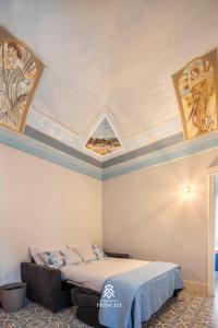 Letto o letti in una camera di Le Dimore dei Principi