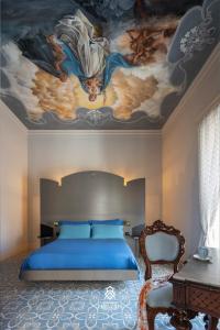 Letto o letti in una camera di Le Dimore dei Principi