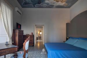 Letto o letti in una camera di Le Dimore dei Principi
