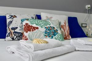 Letto o letti in una camera di Leonardo Suites Scilla