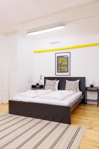 Letto o letti in una camera di The Factory Flat