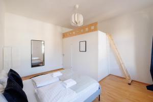 Letto o letti in una camera di The Factory Flat