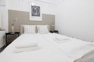 Letto o letti in una camera di The Factory Flat