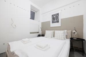 Letto o letti in una camera di The Factory Flat
