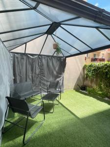Vonkajšia záhrada v ubytovaní Charmant appartement avec terrasse et parking - Centre ville