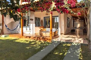 Zahrada ubytování Casa com área gourmet e rede