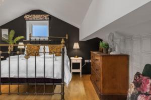 Ένα ή περισσότερα κρεβάτια σε δωμάτιο στο No.1 The Coach House