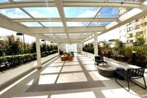 Balkoni atau teres di Spa Particular Vista Congonhas Cozinha Piscina